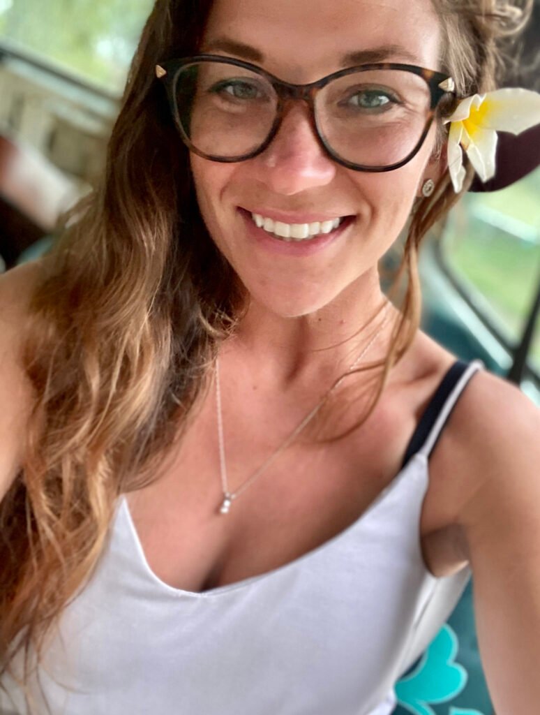 Hi from Ashley with a flower behind her ear in Moorea French Polynesia